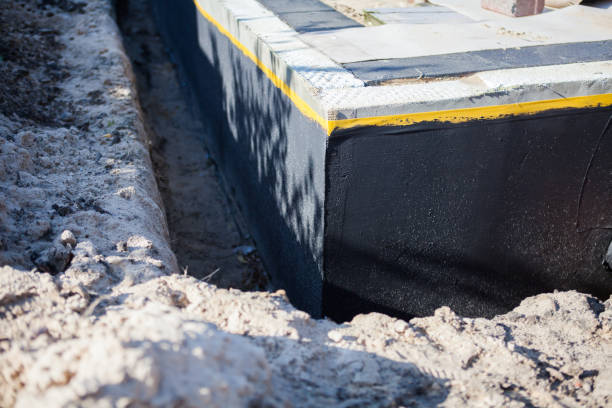 Professional Waterproofing technician working in Jackson, TN